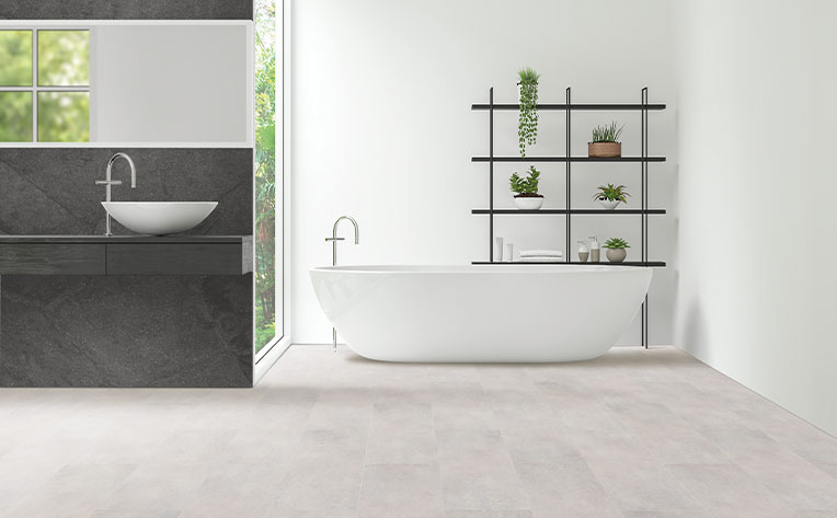 bathroom tile with bath tub in bathroom area